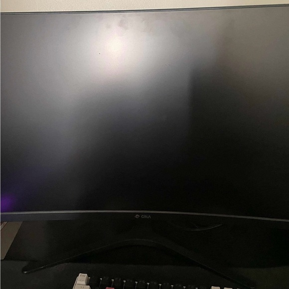 Gaming pc with curved monitor and keyboard and mouse